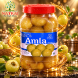 Spoonful of traditional amla murabba served in a bowl for daily wellness