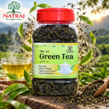 Fresh brewed cup with Natraj The Right Choice Green Tea Leaves jar
