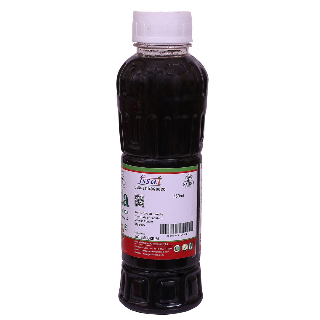 Refreshing glass of cold Joshandha Sharbat drink with mint