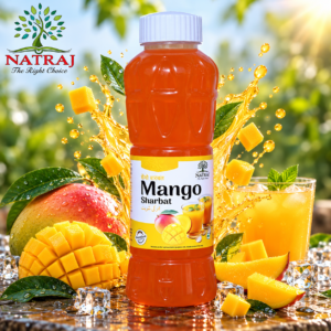 Chilled glass of Mango Sharbat drink made with cold water and ice cubes
