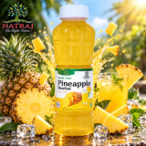 Chilled glass of refreshing pineapple sharbat summer drink with ice and mint